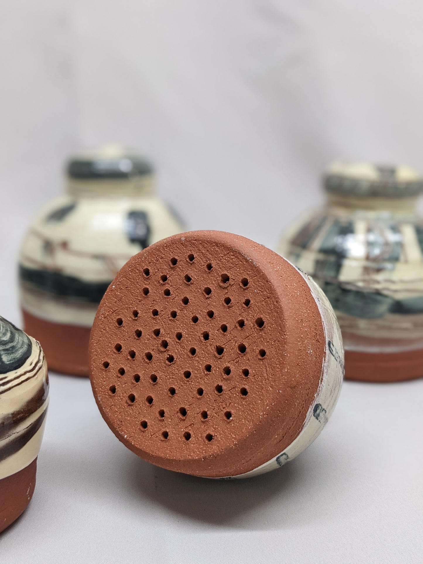 Camille Biddell: Terracotta watering roses